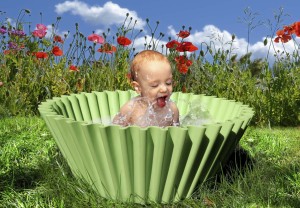 Portrait of the small boy taking bath